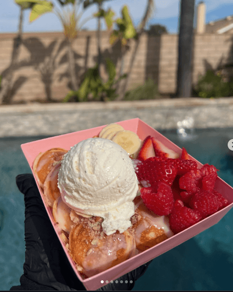 Mini buttermilk pancake bowl with toppings at a poolside event